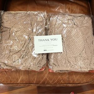 2 Nolan interiors sofa cushion protectors.